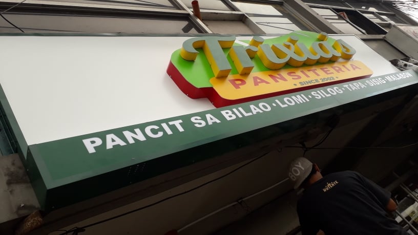 Trixia's Pansiteria signage